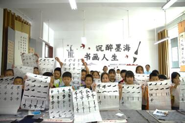 執(zhí)筆書塘埡，共繪振興圖